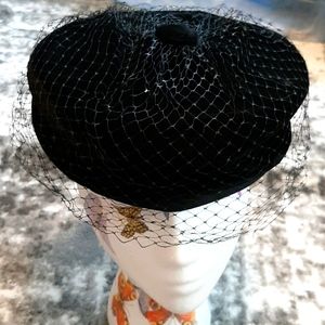 Vintage black velvet pillbox with intact netting